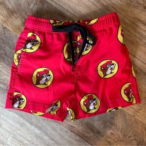 Buc-ee's red swim trunks Size 12-18 months.